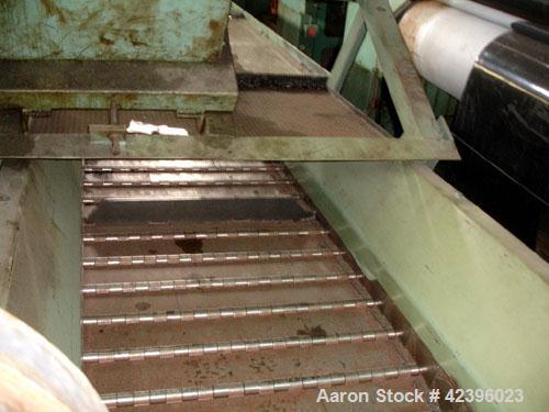 Used Z Style Metal Cleated Belt Conveyor. 36" Wide x 20' long flat section, 11' long inclined section, approximate 84" high discharge height. 18’’ Tall side rails, approximate 32’ overall length. Dri...