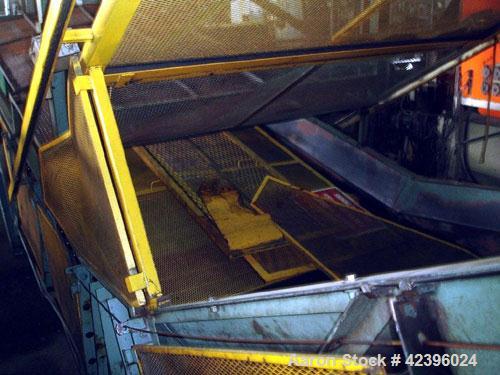 Used L Style Metal Cleated Belt Conveyor. 84" Wide x 9' long flat section, 14' long inclined section, approximate 144" high discharge height. 18’’ Tall side rails, approximate 32’ overall length. Dri...
