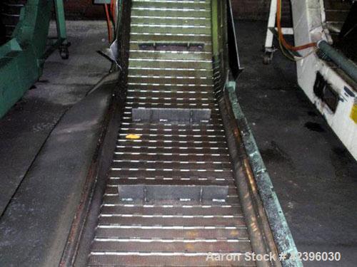 Used Mayfran International Z Style Belt Conveyor. 22" Wide x 7' long flat section, 7' long inclined section, 3’ flat section. Approximate 70" high discharge height. Driven by a 1 hp, 460 volt motor.