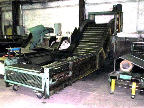 Used Z Style Metal Cleated Belt Conveyor. 46" Wide x 9' long flat section, 7' long inclined section, 4’ flat section. Approximate 84" high discharge height. With motor.