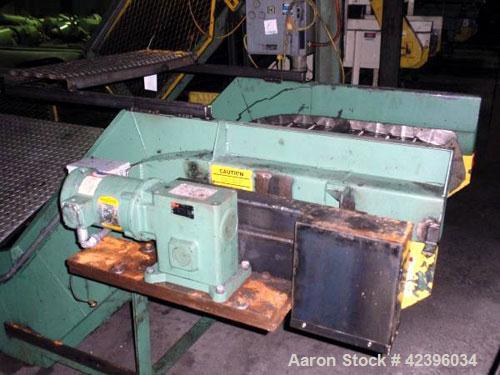 Used Z Style Metal Cleated Belt Conveyor. 28" Wide x 7' long flat section, 3' long inclined section, 3’ flat section. Approximate 40" high discharge height. With motor.