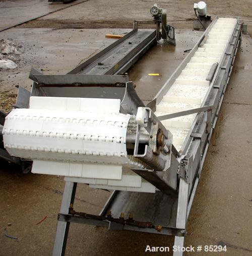Used Incline Belt Conveyor, 304 stainless steel frame. Plastic belt 18" wide x 48" long bottom section x 140 degree 20' long incline section. Driven by a 1 hp, 3/60/208-230/460 volt, 1725 rpm gearmot...