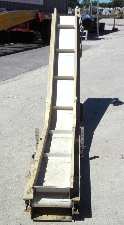 Used Plastic Process Equipment Fixed Incline Belt Conveyor, Model FIC-12, Carbon Steel. 10’’ Wide x 48’’ long bottom horizontal section x 68’’ long inclined section rubber belt with 17’’ long pockets...