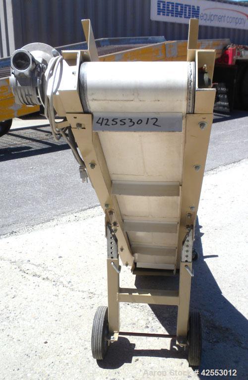 Used Plastic Process Equipment Fixed Incline Belt Conveyor, Model FIC-12, Carbon Steel. 10’’ Wide x 48’’ long bottom horizontal section x 68’’ long inclined section rubber belt with 17’’ long pockets...