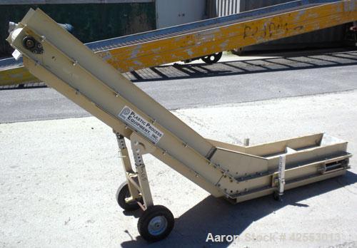 Used Plastic Process Equipment Fixed Incline Belt Conveyor, Model FIC-12, Carbon Steel. 10’’ Wide x 48’’ long bottom horizontal section x 68’’ long inclined section rubber belt with 17’’ long pockets...