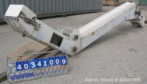 Used Rapat Corp "S" shaped flexwall incline conveyor, model FLX21.516. Carbon steel frame, approximately 12" wide cleated rubber belt, 1" tall accordion sides, 51" long top infeed section, 12' long i...