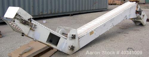 Used Rapat Corp "S" shaped flexwall incline conveyor, model FLX21.516. Carbon steel frame, approximately 12" wide cleated rubber belt, 1" tall accordion sides, 51" long top infeed section, 12' long i...