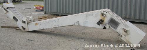 Used Rapat Corp "S" shaped flexwall incline conveyor, model FLX21.516. Carbon steel frame, approximately 12" wide cleated rubber belt, 1" tall accordion sides, 51" long top infeed section, 12' long i...