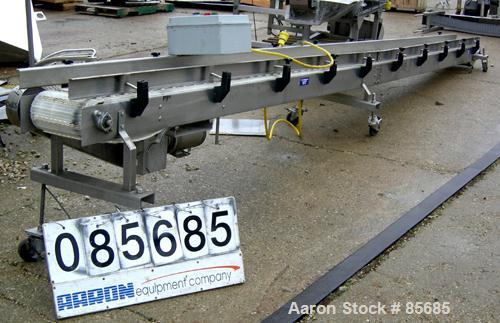 Used SIM Fabricators Incline Belt Conveyor. Plastic belt 12" wide x 232" long x 32" discharge height. Stainless steel sides, adjustable side rails. Driven by a 1 HP, 3/60/230/460 Volt, 1740 RPM gearm...