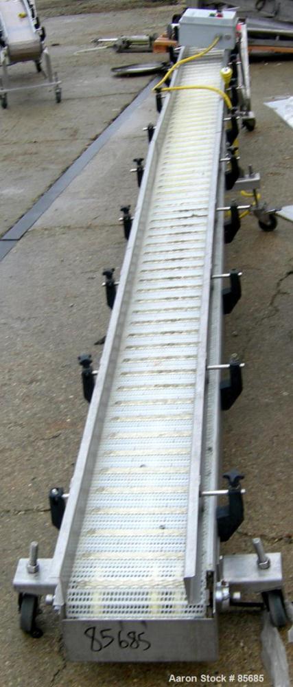 Used SIM Fabricators Incline Belt Conveyor. Plastic belt 12" wide x 232" long x 32" discharge height. Stainless steel sides, adjustable side rails. Driven by a 1 HP, 3/60/230/460 Volt, 1740 RPM gearm...