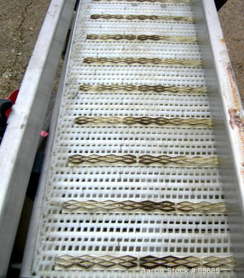 Used SIM Fabricators Incline Belt Conveyor. Plastic belt 12" wide x 232" long x 32" discharge height. Stainless steel sides, adjustable side rails. Driven by a 1 HP, 3/60/230/460 Volt, 1740 RPM gearm...