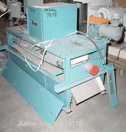 USED: Thayer belt weigh feeder, model MXL-13TM-I. Capacity 500-800pounds an hour. 13" wide x 42" long Buna N belt. 9" x 10-1/2" topfeed, no hopper, end bottom discharge. Driven by a 1/4 hp gear motor.