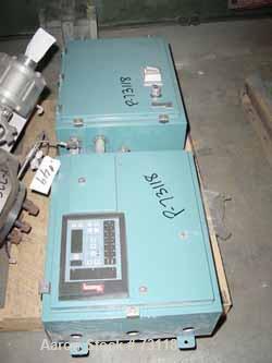 USED: Thayer belt weigh feeder, model MXL-13TM-I. Capacity 500-800pounds an hour. 13" wide x 42" long Buna N belt. 9" x 10-1/2" topfeed, no hopper, end bottom discharge. Driven by a 1/4 hp gear motor.