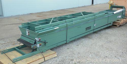 Used Titan Industries Pleated Belt Conveyor, model 304, carbon steel. 24’’ Wide x 208’’ long rubber belt with 11-1/2’’ long pockets with 2-1/2’’ tall pleats. 180’’ Long section of Lexan sheet top cov...