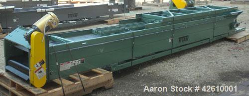 Used Titan Industries Pleated Belt Conveyor, model 304, carbon steel. 24’’ Wide x 208’’ long rubber belt with 11-1/2’’ long pockets with 2-1/2’’ tall pleats. 180’’ Long section of Lexan sheet top cov...