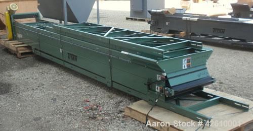 Used Titan Industries Pleated Belt Conveyor, model 304, carbon steel. 24’’ Wide x 208’’ long rubber belt with 11-1/2’’ long pockets with 2-1/2’’ tall pleats. 180’’ Long section of Lexan sheet top cov...