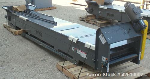 Used Titan Industries Pleated Belt Conveyor, model 304, carbon steel. 24’’ Wide x 177’’ long rubber belt with 11-1/2’’ long pockets with 2-1/2’’ tall pleats. 148’’ Long section of Lexan sheet top cov...