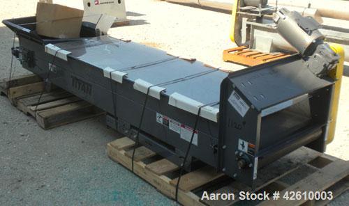 Used Titan Industries Pleated Belt Conveyor, model 304, carbon steel. 24’’ Wide x 118’’ long rubber belt with 11-1/2’’ long pockets with 2-1/2’’ tall pleats. 88’’ Long section of Lexan sheet top cove...