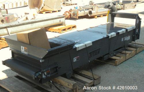 Used Titan Industries Pleated Belt Conveyor, model 304, carbon steel. 24’’ Wide x 118’’ long rubber belt with 11-1/2’’ long pockets with 2-1/2’’ tall pleats. 88’’ Long section of Lexan sheet top cove...