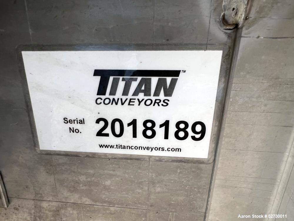 Used- Titan Conveyors Belt Conveyor. Approximate 348" long x 18" wide belt. Driven by a 1hp, 3/60/230/460 volt, 1760rpm moto...