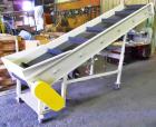 Used- One 36" wide x 13' long conveyor with bottom hopper. Painted with new cleated belt. On casters with adjustable legs.