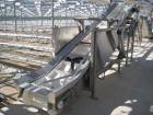 Used Incline conveyor 20 inch wide x 14 feet long to 6 foot high elevation with air cylinder to raise and lower the infeed section.  Hopper side walls to fill with chilled water, used as quench tank ...