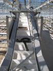 Used Incline conveyor 20 inch wide x 14 feet long to 6 foot high elevation with air cylinder to raise and lower the infeed section.  Hopper side walls to fill with chilled water, used as quench tank ...