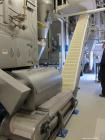 Used 17'' Wide x Approximate 13 ft High Inclined Plastic Interlocking Cleated Stainless Steel Conveyor