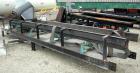 USED: Rubber belt conveyor, carbon steel frame. Rubber belt approximately 26