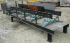 USED: Rubber belt conveyor, carbon steel frame. Rubber belt approximately 26