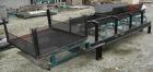 USED: Rubber belt conveyor, carbon steel frame. Rubber belt approximately 26