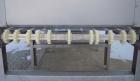 Used Heat and Control MinuteMan Accumulation Conveyor System, model CV-BT-ACCUM, 304 stainless steel. Approximate 200 cubic foot capacity. 60