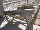 Used Lyco incline conveyor 18 in wide x 5 ft long with 1 in H cleats.