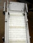 Used Incline Belt Conveyor, 304 stainless steel frame. Plastic belt 18