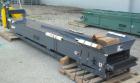 Used Titan Industries Pleated Belt Conveyor, model 304, carbon steel. 24’’ Wide x 177’’ long rubber belt with 11-1/2’’ long pockets with 2-1/2’’ tall pleats. 148’’ Long section of Lexan sheet top cov...