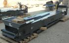 Used Titan Industries Pleated Belt Conveyor, model 304, carbon steel. 24’’ Wide x 177’’ long rubber belt with 11-1/2’’ long pockets with 2-1/2’’ tall pleats. 148’’ Long section of Lexan sheet top cov...