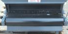Used Titan Industries Pleated Belt Conveyor, model 304, carbon steel. 24’’ Wide x 177’’ long rubber belt with 11-1/2’’ long pockets with 2-1/2’’ tall pleats. 148’’ Long section of Lexan sheet top cov...