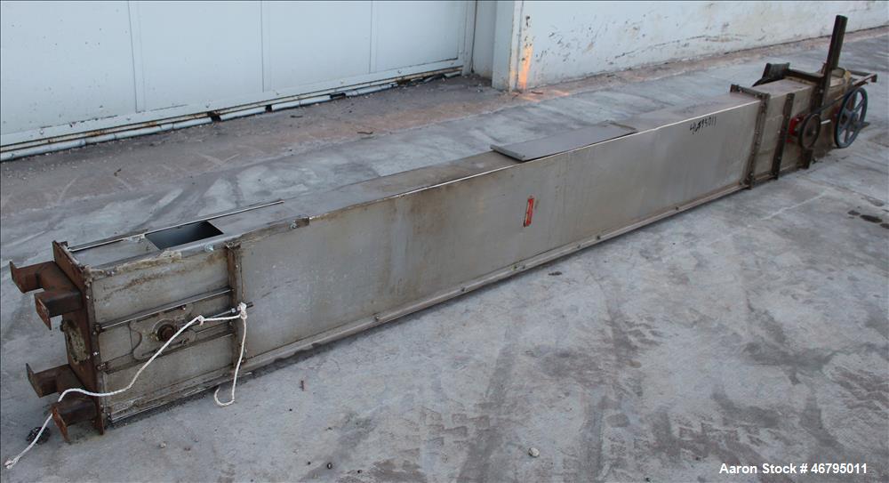 Used Bucket Elevator, Vertical. Approximate 12' Tall housing with 3-1/4" long x 4" wide x 3" deep poly buckets on 5-1/2" centers. Driven by a 0.5hp, 3/60/208-230/460 volt, 1725 rpm motor. 304 Stainle...