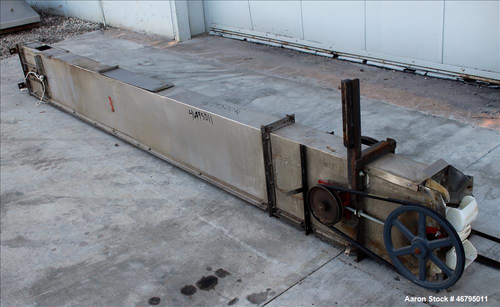 Used Bucket Elevator, Vertical. Approximate 12' Tall housing with 3-1/4" long x 4" wide x 3" deep poly buckets on 5-1/2" centers. Driven by a 0.5hp, 3/60/208-230/460 volt, 1725 rpm motor. 304 Stainle...