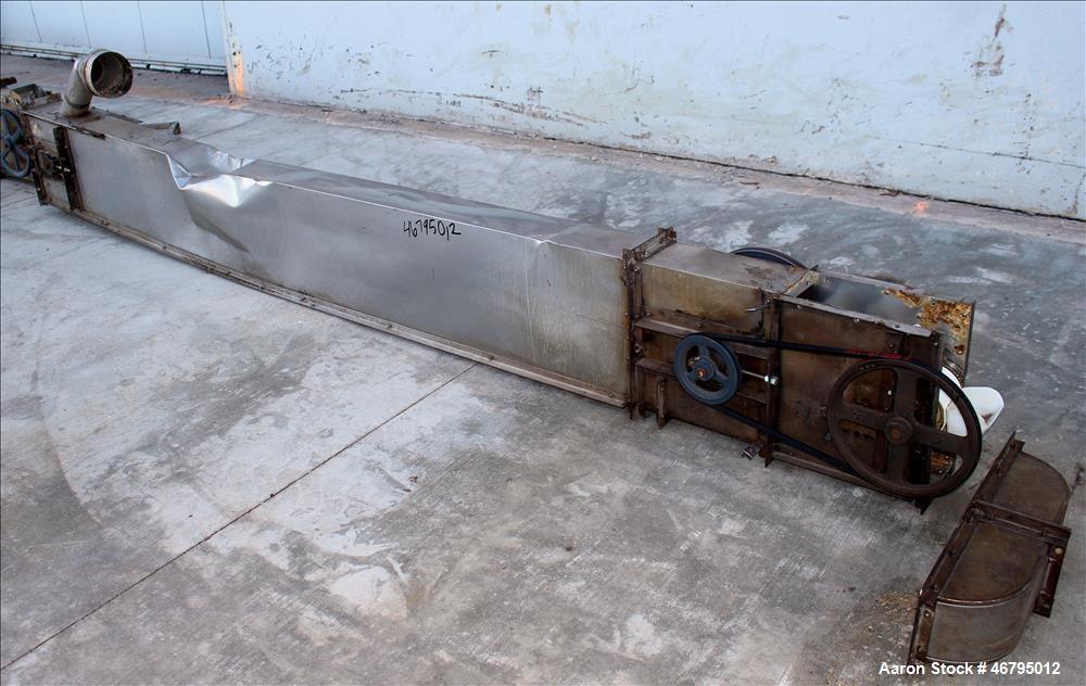Used Bucket Elevator, Vertical. Approximate 12' Tall housing with 3-1/4" long x 4" wide x 3" deep poly buckets on 5-1/2" centers. Driven by a 0.5hp, 3/60/208-230/460 volt, 1725 rpm motor. 304 Stainle...
