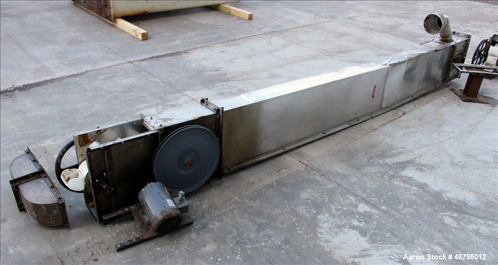 Used Bucket Elevator, Vertical. Approximate 12' Tall housing with 3-1/4" long x 4" wide x 3" deep poly buckets on 5-1/2" centers. Driven by a 0.5hp, 3/60/208-230/460 volt, 1725 rpm motor. 304 Stainle...