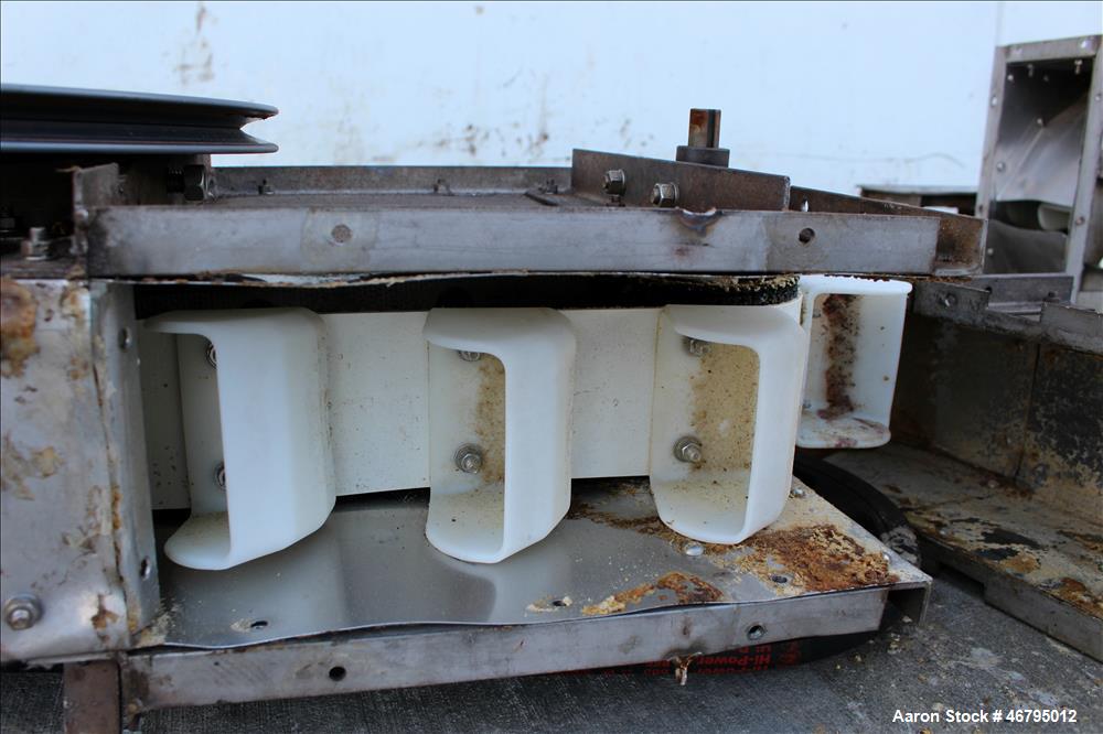 Used Bucket Elevator, Vertical. Approximate 12' Tall housing with 3-1/4" long x 4" wide x 3" deep poly buckets on 5-1/2" centers. Driven by a 0.5hp, 3/60/208-230/460 volt, 1725 rpm motor. 304 Stainle...
