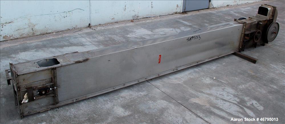 Used Bucket Elevator, Vertical. Approximate 12' Tall housing with 3-1/4" long x 4" wide x 3" deep poly buckets on 5-1/2" centers. Driven by a 0.5hp, 3/60/208-230/460 volt, 1725 rpm motor. 304 Stainle...
