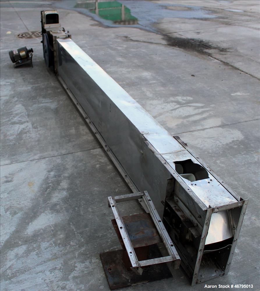 Used Bucket Elevator, Vertical. Approximate 12' Tall housing with 3-1/4" long x 4" wide x 3" deep poly buckets on 5-1/2" centers. Driven by a 0.5hp, 3/60/208-230/460 volt, 1725 rpm motor. 304 Stainle...