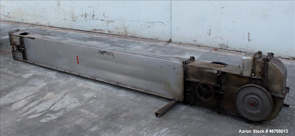 Used Bucket Elevator, Vertical. Approximate 12' Tall housing with 3-1/4" long x 4" wide x 3" deep poly buckets on 5-1/2" centers. Driven by a 0.5hp, 3/60/208-230/460 volt, 1725 rpm motor. 304 Stainle...
