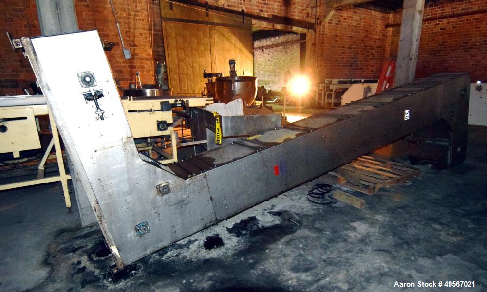 Used Schebbler Bucket Elevator. Plastic buckets approximate 14-1/2" wide x 6" long x 4" deep, stainless steel housing. Bottom horizontal section approximate 4' long, vertical section approximate 15' ...