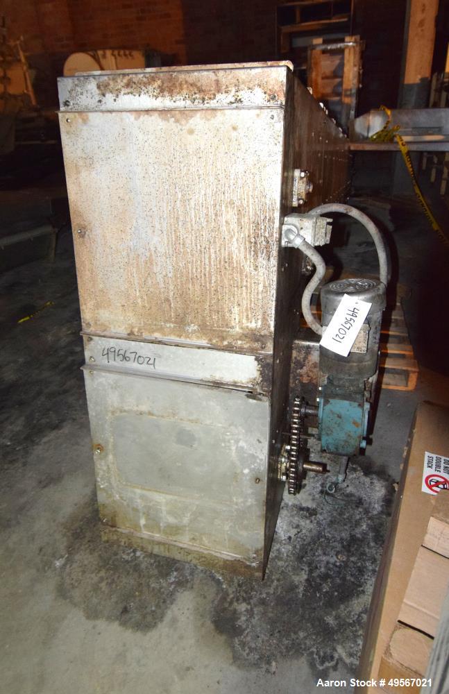 Used Schebbler Bucket Elevator. Plastic buckets approximate 14-1/2" wide x 6" long x 4" deep, stainless steel housing. Bottom horizontal section approximate 4' long, vertical section approximate 15' ...