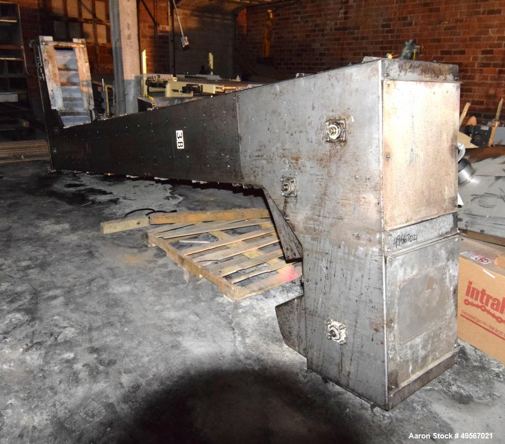 Used Schebbler Bucket Elevator. Plastic buckets approximate 14-1/2" wide x 6" long x 4" deep, stainless steel housing. Bottom horizontal section approximate 4' long, vertical section approximate 15' ...