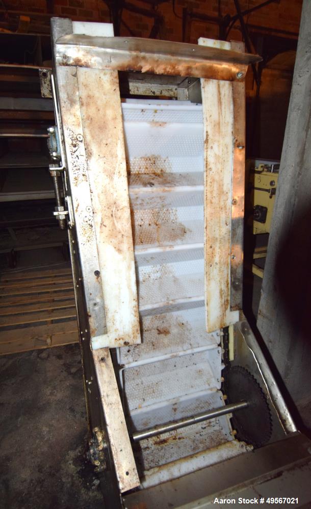 Used Schebbler Bucket Elevator. Plastic buckets approximate 14-1/2" wide x 6" long x 4" deep, stainless steel housing. Bottom horizontal section approximate 4' long, vertical section approximate 15' ...