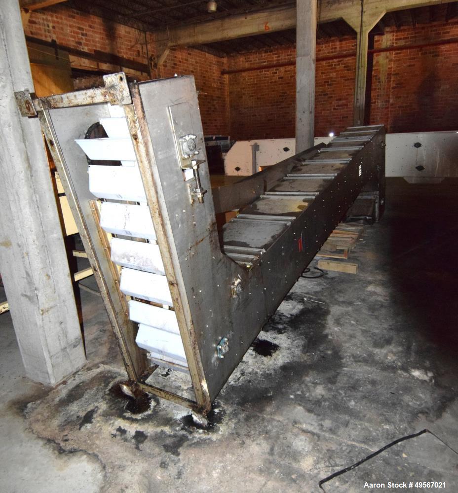 Used Schebbler Bucket Elevator. Plastic buckets approximate 14-1/2" wide x 6" long x 4" deep, stainless steel housing. Bottom horizontal section approximate 4' long, vertical section approximate 15' ...